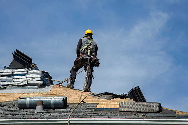 Professional Roof Replacement technician working in Wheeling, IL